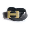 A black genuine leather dress belt with a brass buckle is shown on a white background.