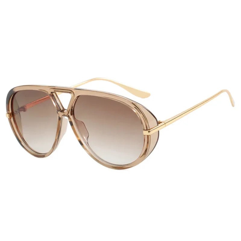 Gold-framed aviator style sunglasses with tinted lenses