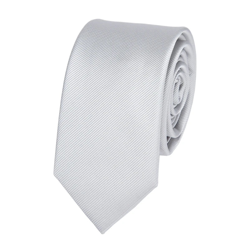 A white men's slim jacquard business tie folded and displayed against a white background.