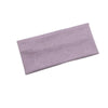 A lavender knitted sports headband designed for yoga and gym activities.