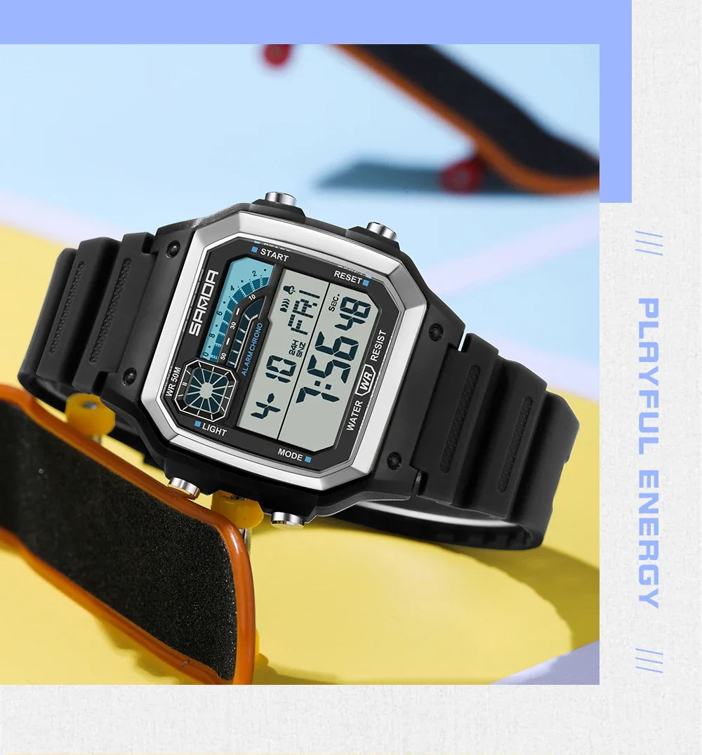 A black sport digital wristwatch with a silver casing and dark strap is shown on a yellow background.