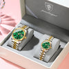 A pair of matching watches with luminous hands and date display are displayed in a gray box.