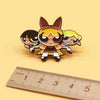 A set of five retro cartoon enamel lapel pins featuring stylized animal characters in various colors