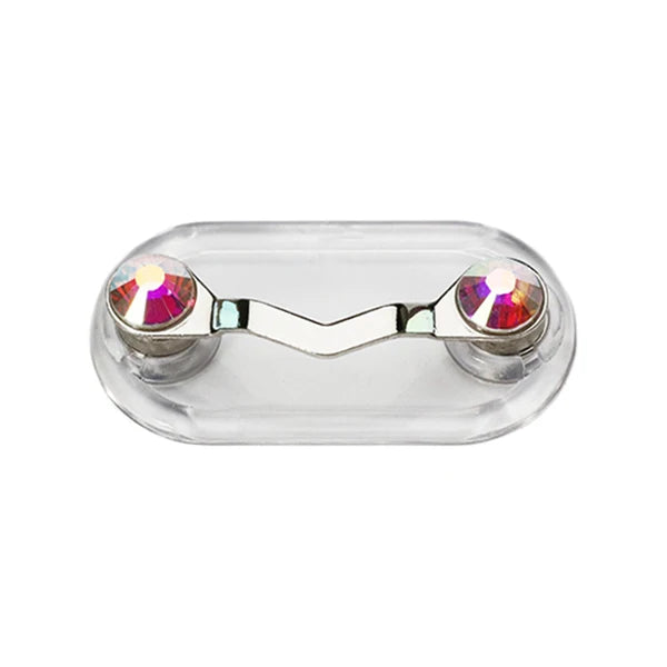 A clear plastic magnetic clip designed to hold eyeglasses, featuring two polished metal prongs and small colored gems.