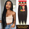A model showcases long black pre-stretched Kanekalon braiding hair extensions with a premium finish.