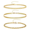 A set of three gold-toned waterproof stainless steel anklets for women displayed against a white background.
