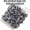 A pile of gray satin fabric scrunchies is shown on a white background.