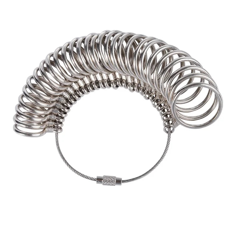 A silver precision metal ring sizer and mandrel tool kit with coiled rings.
