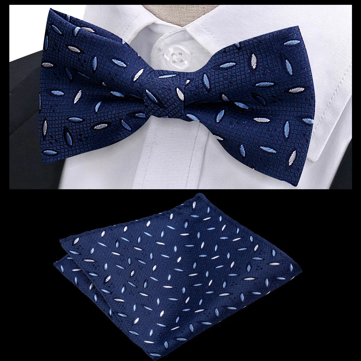 Navy blue patterned bow tie and matching accessory set displayed against a white shirt.