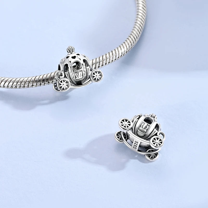 Sterling silver devil's eye charm bracelet featuring a detailed charm and chain.