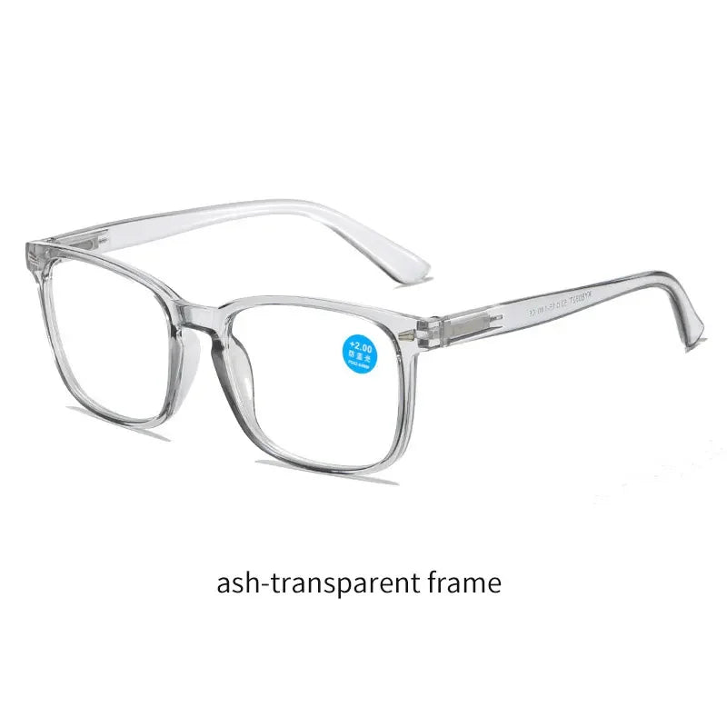 Un par de gafas de lectura con montura de color ahumado y lentes transparentes.