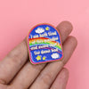 A colorful enamel pin featuring text about a grandpa and sarcastic humor