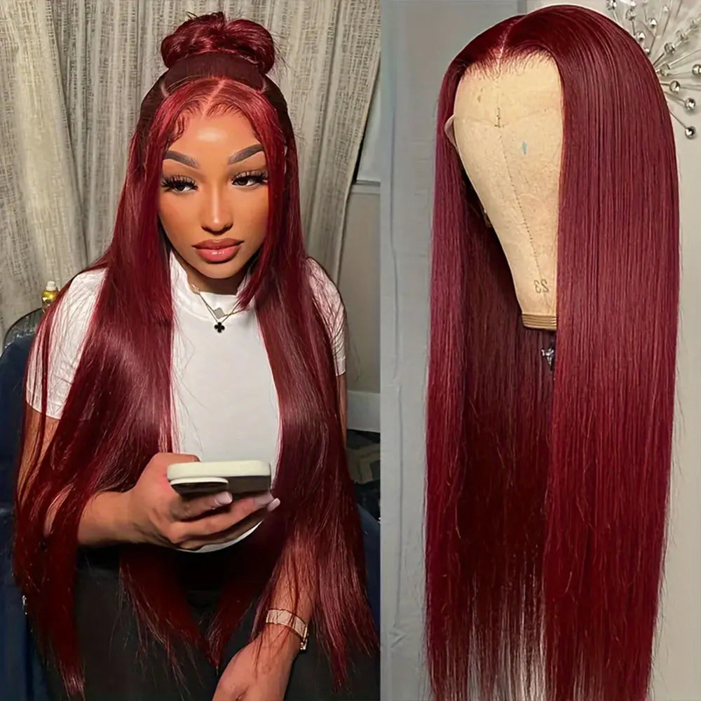 A close-up of a long, straight, reddish-burgundy wig with a blonde lace front wig cap.