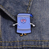 A cartoon towel enamel pin featuring a purple, surprised-looking character on a denim fabric background.