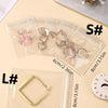 Clear self-sealing jewelry storage pouches showing various silver and gold jewelry pieces.
