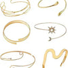 A set of six gold-plated swirl cuff armbands displayed individually.
