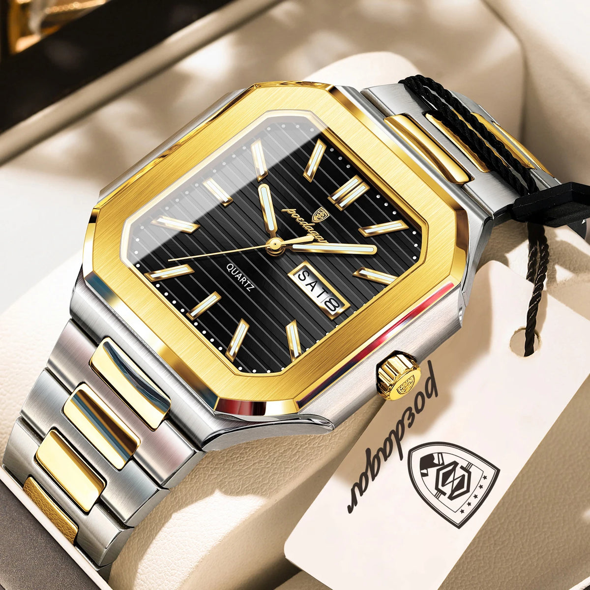 A close-up of a gold and silver stainless steel quartz watch with a black dial and luminous features resting on a light-color