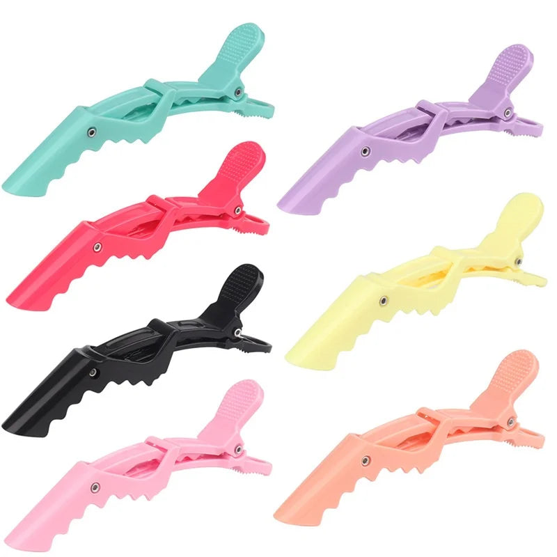A set of six sturdy alligator hair sectioning clips in various pastel colors including mint green, pink, purple, and yellow.
