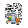 An enamel pin featuring a text design that reads Multiple Drinks at Once Club with illustrations of various beverages.