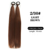 A pair of light brown synthetic long straight hair extensions, 18 inches long.