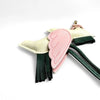 A pink and cream elegant winged pony keychain featuring felt wings and green tassels.