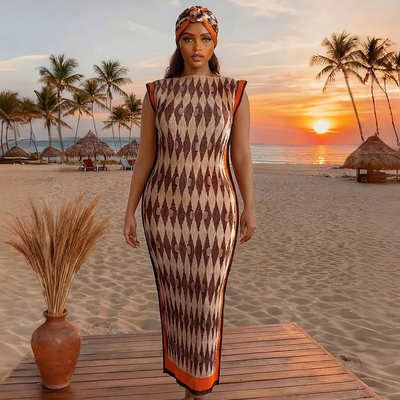 A plus size model wearing an African silk printed two-piece set stands on a wooden deck with a tropical sunset and palm trees
