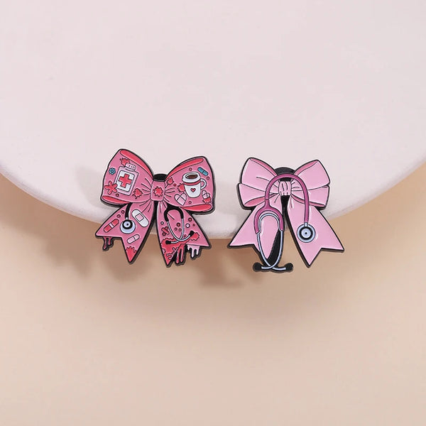 Pink bow stethoscope enamel pin brooch featuring a pink bow and a stethoscope design
