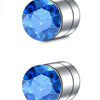 A close-up view of a magnetic nose stud earring featuring a round blue cubic zirconia stone set in stainless steel.