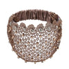 A brown beaded headband adorned with crystals and pearls, featuring a floral pattern.