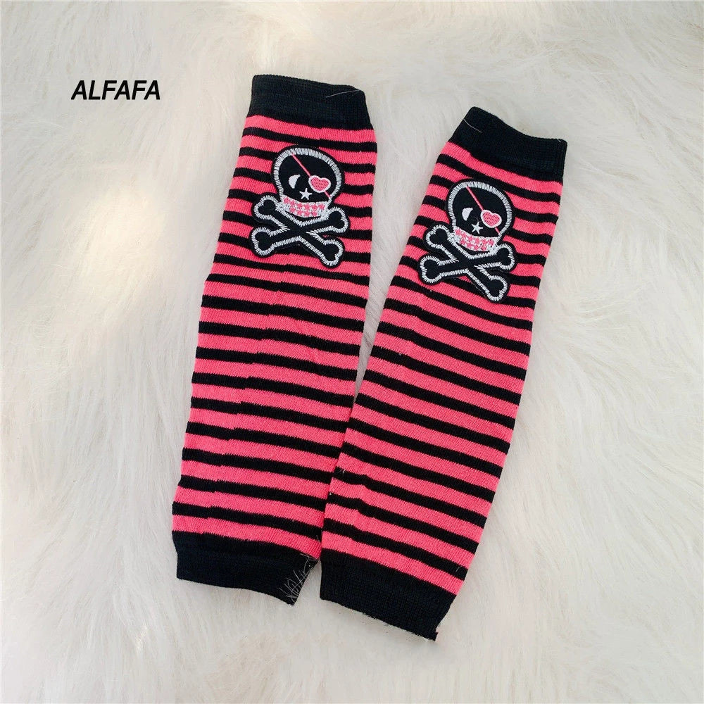 Black and pink striped fingerless socks featuring a skull graphic for Y2K grunge accessories