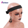 A model wearing a black elastic wig band and gold dangle earrings.