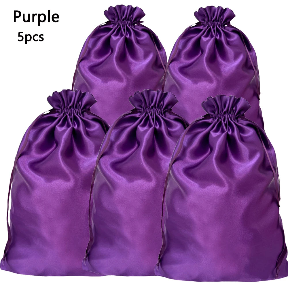 Five purple satin drawstring storage bags for hair tools
