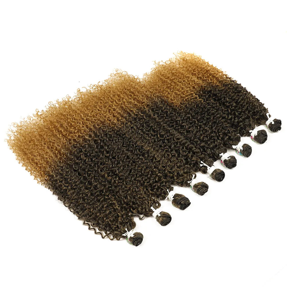 A bundle of long curly hair extensions showing a gradient from light golden brown to dark brown.