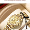 A gold-toned quartz wristwatch is displayed on a light background, highlighting its movement and design.