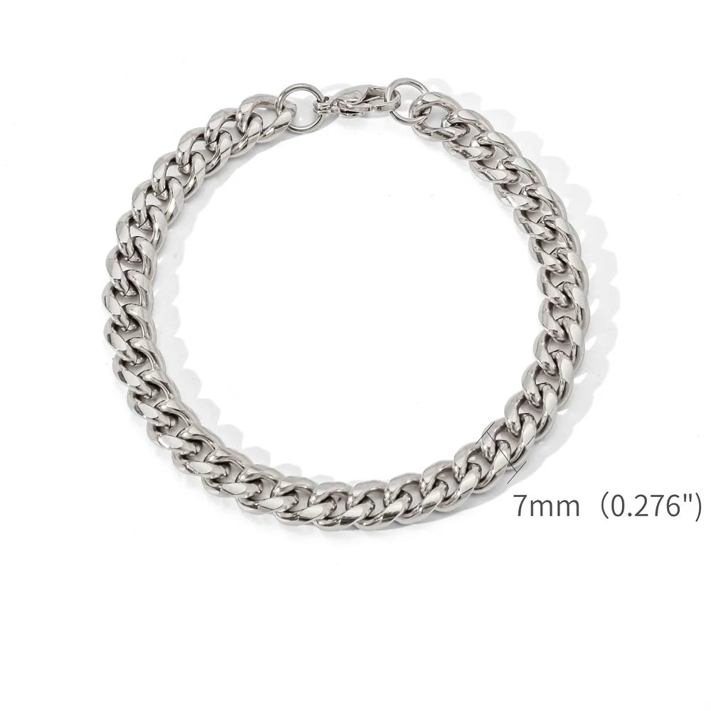 A silver stainless steel Cuban link bracelet shown against a white background.