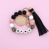 Leopard silicone bead key chain featuring black and pink beads and a mama charm