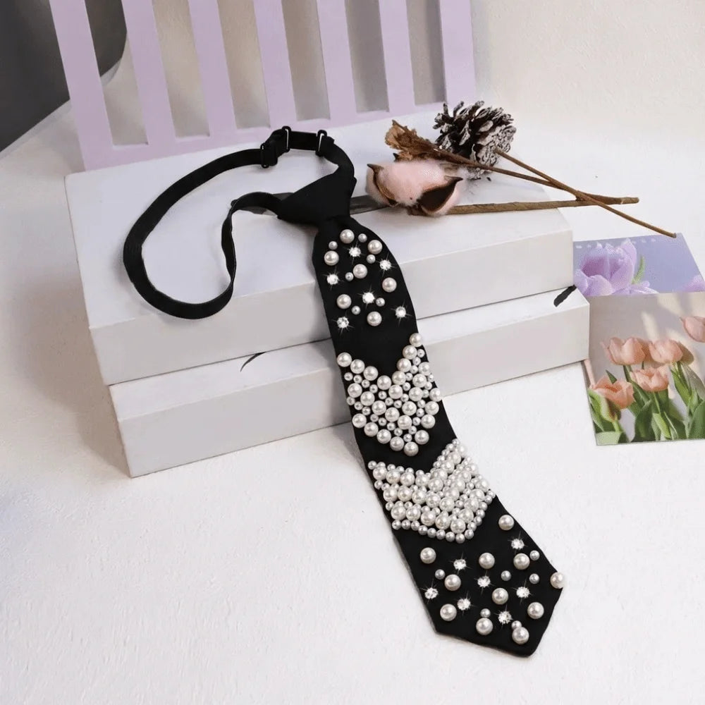 Elegant black rhinestone pearl tie for academic or daily wear displayed on a white box.