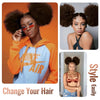 A woman shows off a hairstyle change, featuring an afro puff drawstring ponytail.