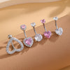 A set of five gold stainless steel dangled belly button rings featuring heart and diamond-cut stones.