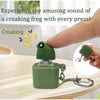 A green frog fidget toy keychain is shown being pressed, with text describing the amusing sound it makes.