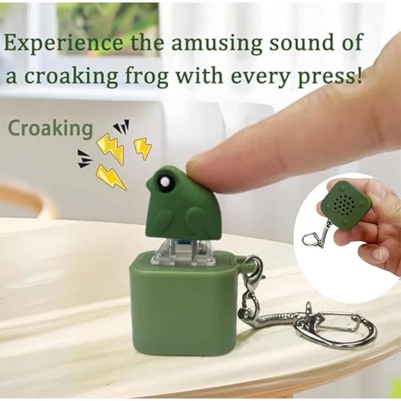 A green frog fidget toy keychain is shown being pressed, with text describing the amusing sound it makes.