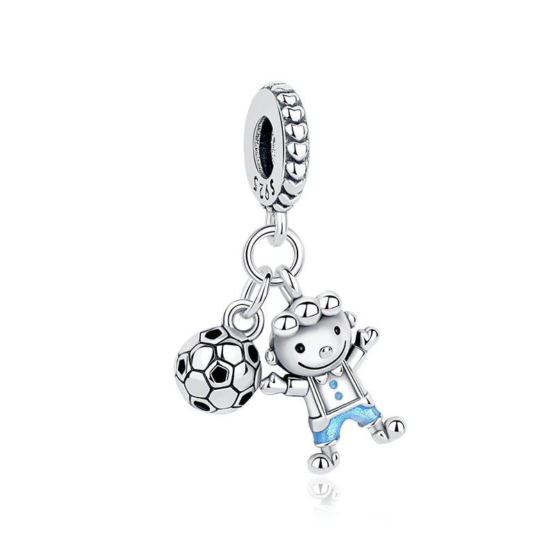 A silver family tree charm necklace featuring a small bear figure and leaves.