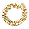A thick gold Cuban link chain necklace with a textured finish and a diamond-encrusted clasp.