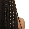 Long black hair adorned with multiple gold metal rings and clips woven into braids