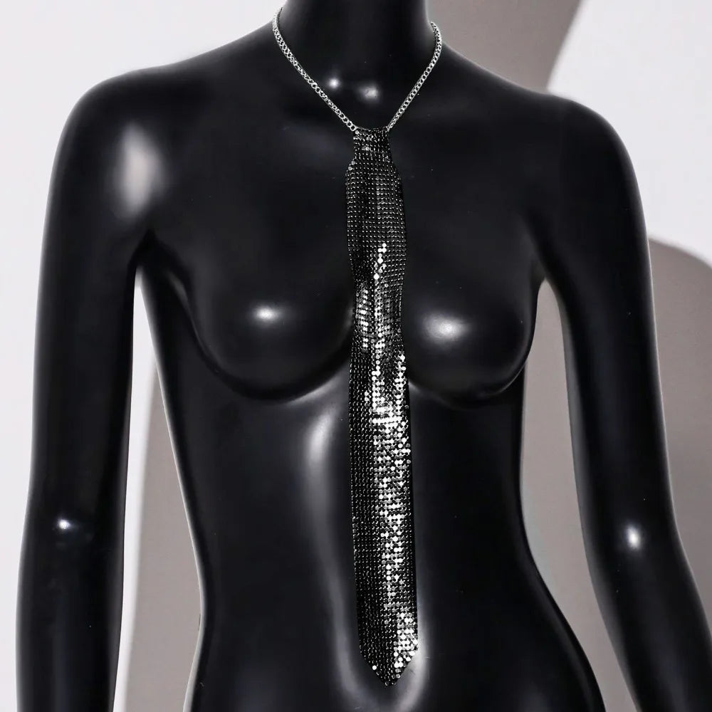 A black sequin rhinestone neck tie necklace displayed on a black mannequin.