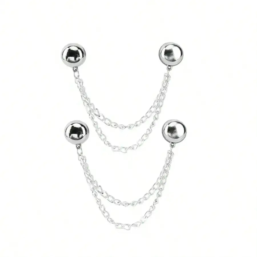 A set of silver multi-function magnetic clothing clips with small spherical heads.