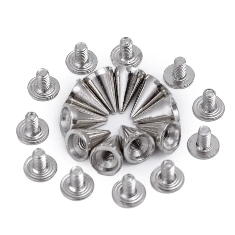 A collection of silver punk rock bullet rivets for DIY crafting, shown from above.