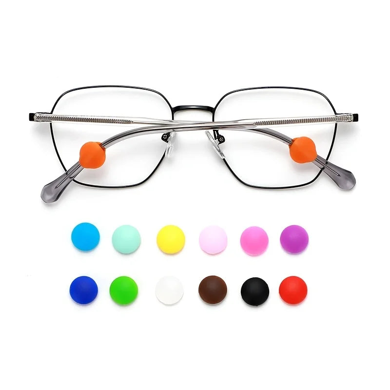 A set of silicone eyeglass grips in various colors including orange, pink, and blue.