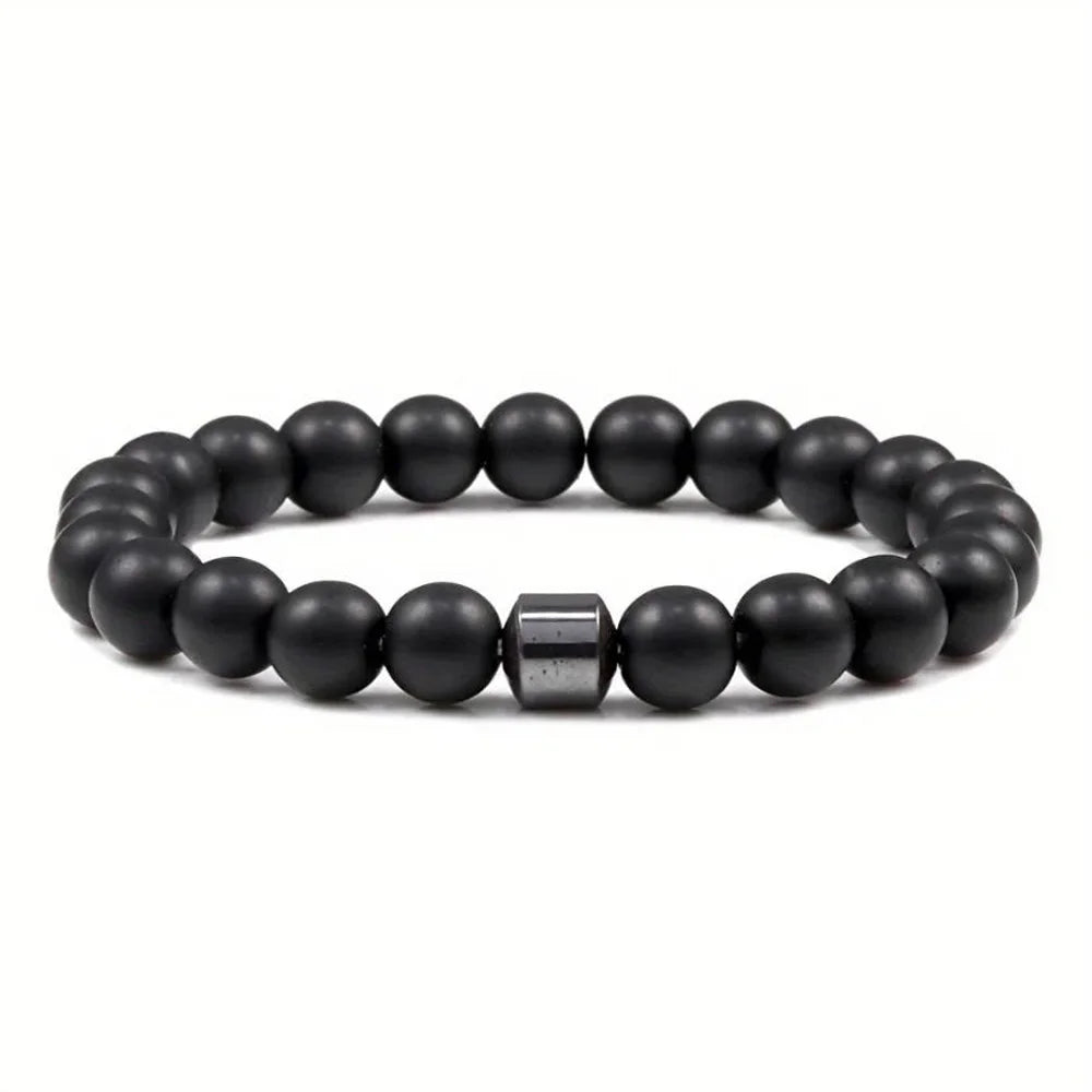 A black Tiger Eye lava map bracelet made of polished, round beads.