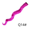 A vibrant magenta synthetic hair extension displayed as a long, smooth, wavy strand.